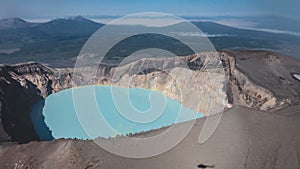 A lifeless acid lake in the caldera of an extinct volcano.