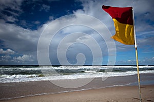 Lifesaver flag on the Gold Coast beach