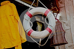 Lifesaver or life preserver with rope around