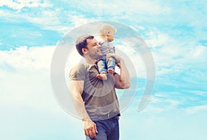 Lifestyle atmospheric photo happy father and son outdoors