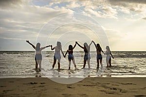 Lifestyle back portrait of young group of Asian Korean and Chinese women , happy and attractive girlfriends enjoying Summer holida