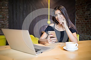 Lifestyle coffee, woman using smartphone for search information in cafe shop.