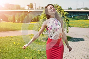 lifestyle concept - beautiful happy woman enjoying summer outdoors