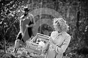 Lifestyle and family life. Image of two happy farmers with instruments. I like spending time on farm. Two people walking