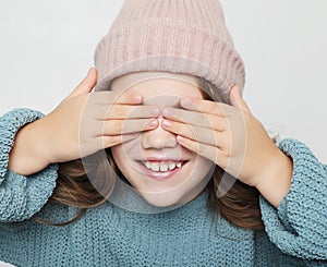 Lifestyle, happyness and people concept: little girl with closed eyes