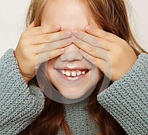 Lifestyle, happyness and people concept: little girl with closed eyes