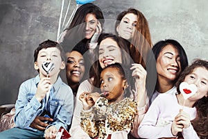 Lifestyle and people concept: young pretty diversity nations woman with different age children celebrating on birth day