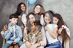 Lifestyle and people concept: young pretty diversity nations woman with different age children celebrating on birth day