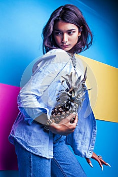 Lifestyle people concept. young pretty smiling indian girl with long nails wearing lot of jewelry rings holding