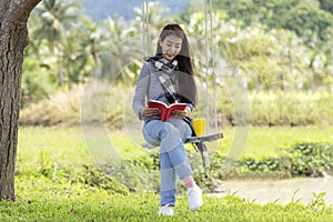 Lifestyle people girl reading book and drinking coffee for education outdoor garden at home.