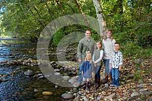 Lifestyle Portrait of a Five Person Family Outdoors