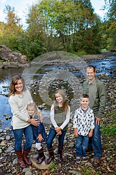 Lifestyle Portrait of a Five Person Family Outdoors