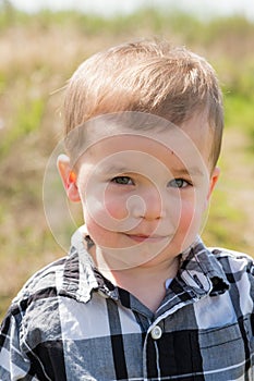 Lifestyle Portrait Young Boy Outdoors