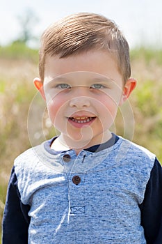 Lifestyle Portrait Young Boy Outdoors