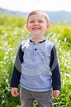 Lifestyle Portrait Young Boy Outdoors