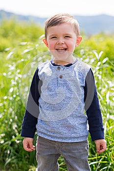 Lifestyle Portrait Young Boy Outdoors