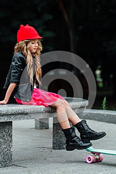 Lifestyle, summer and childhood concept - young woman, teenage girl. portrait of stylish little girl