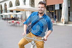 Lifestyle, transport and people concept ,young man riding bicycle in the city