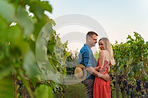 Lifestyle of a woman and a man walking on the terraces of the vineyards