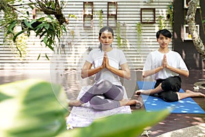 Lifestyle woman and teenage student yoga exercise and pose for healthy life.