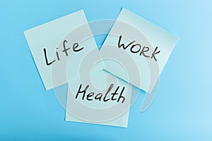 Lifework and health balance concept. Stickers with life, work and balance caption on a blue background