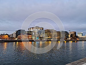 Liffey River and modern offices at sunset, Dublin Ireland