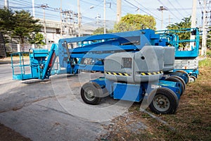 Lifting boom lift in construction site., Business industry