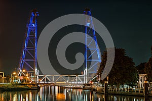 A lifting bridge near Gouda, Holland is illuminated by blue lights