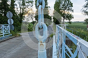 The lifting bridge over the Tina River Å»uÅ‚awy in Poland.