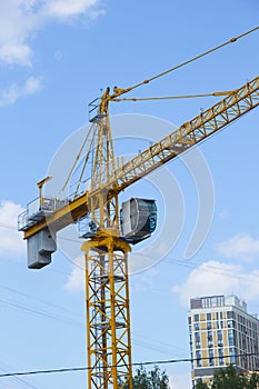 Lifting crane. Crane work on the construction site