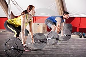 Lifting weights at a gym