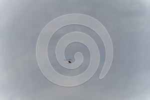 Light aircraft, deltaplane, against the sky with white clouds. deltaplane