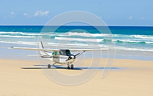 Light Aircraft Taking off on Beach