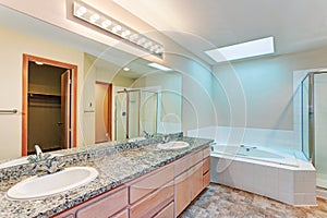 Light and airy bathroom with jetted tub photo