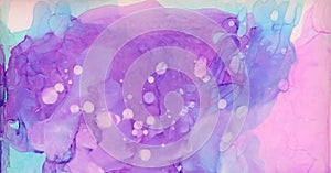 Light alcohol ink painted sky blue, pink and purple color abstract background. Bright watercolor texture effect for invitations