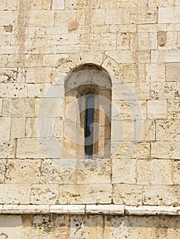 Light aperture on stone facade