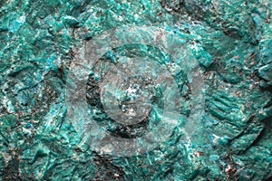 Light aquamarine stone background with microcracks, splashes of quartz
