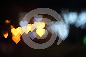 Light, beautiful bokeh heart shaped and blur at night.