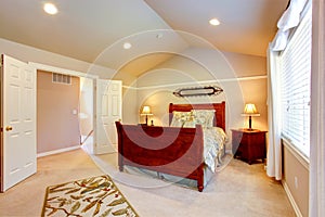 Light bedroom with vaulted ceiling