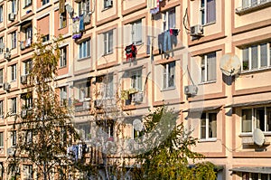 Light beige facade of a residential building. Cozy urban