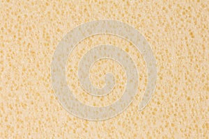 Light beige foam, EVA texture with porous surface.