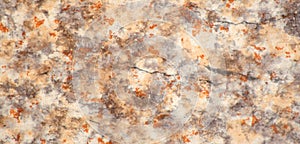 Light beige granite with brown inclusions and veins, close-up of natural stone texture