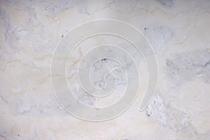 Light beige natural stone marble from Italy with gray stains, called Dolce Sogno