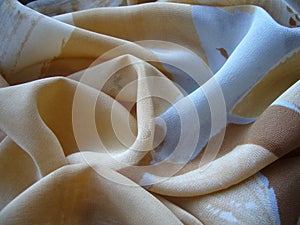 Light beige silk, crepe de chine. The texture of the fabric.