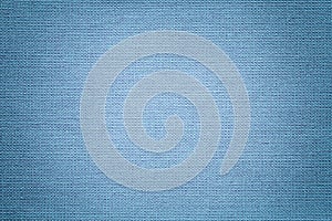 Light blue background from a textile material. Fabric with natural texture. Backdrop