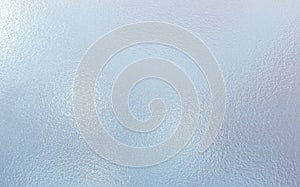 Light blue color frosted Glass texture background photo