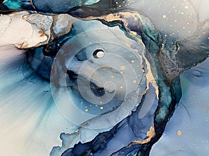 Light blue and dark blue abstract backgroud made with alcohol ink and gold pigment