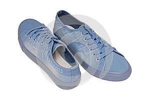 Light blue footwear, textile sneakers are on white background