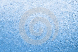 Light blue frozen window glass