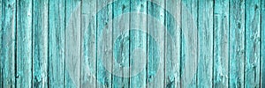 Light blue green wood texture. Old weathered shabby wood surface. Turquoise vintage background with copy space for design.